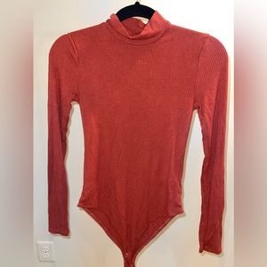 Forever 21 burnt orange bodysuit. Size small. Mock neck.